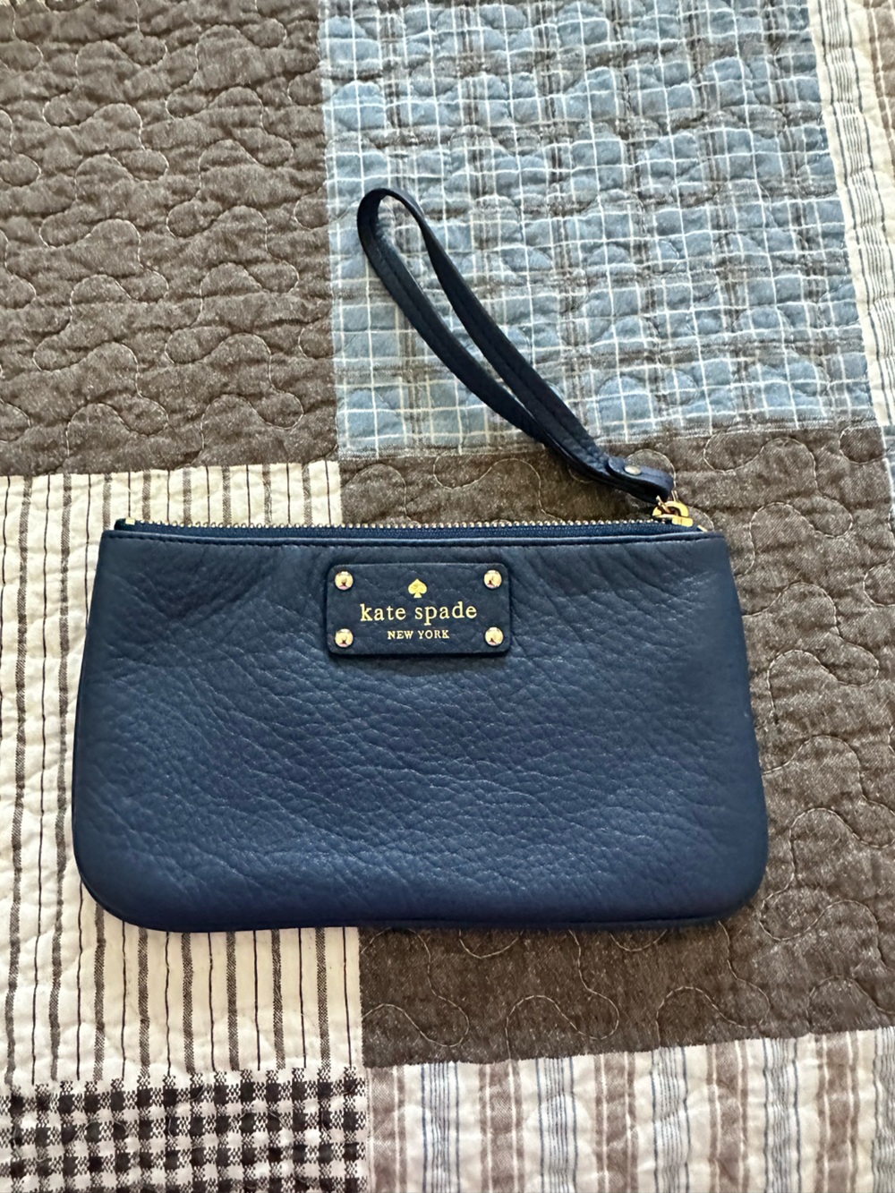 kate spade navy leather wristlet with gold hardware